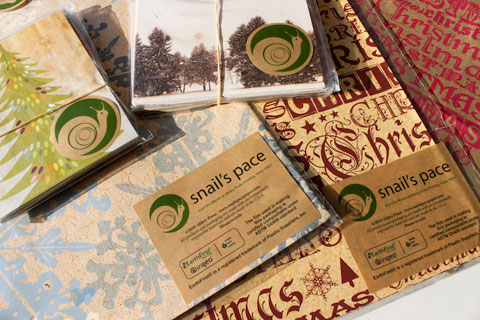 GL_ecowrap_snailspace2 Snail's Pace uses 100% recycled FSC certified paper, soy inks and plant-derived plastics.